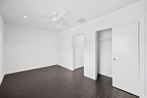 an empty room with a bathroom