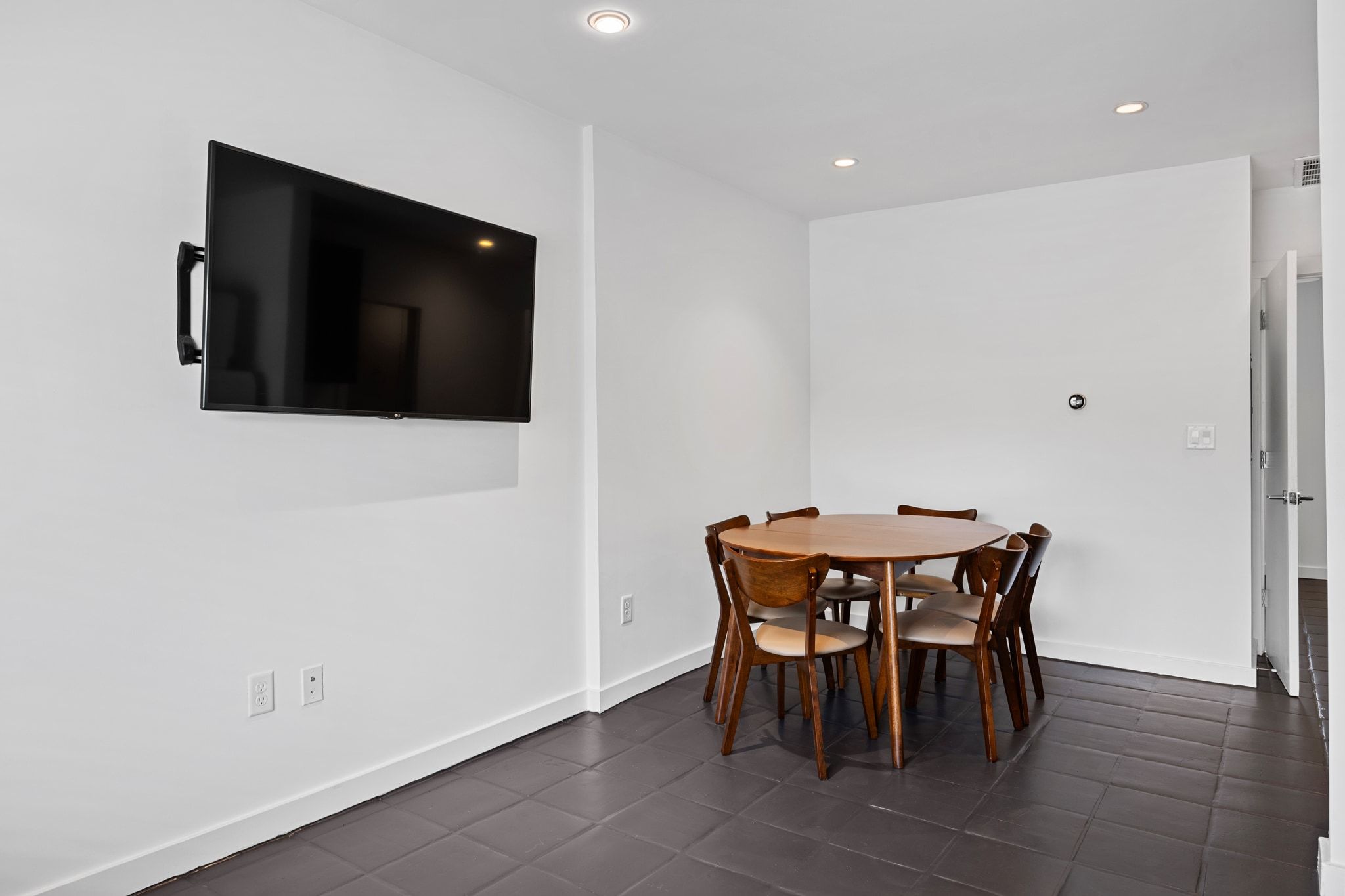 1200 Enfield Road, Unit 205 Austin, TX 78703 - Photo 13 of 20 a view of a dining room with furniture