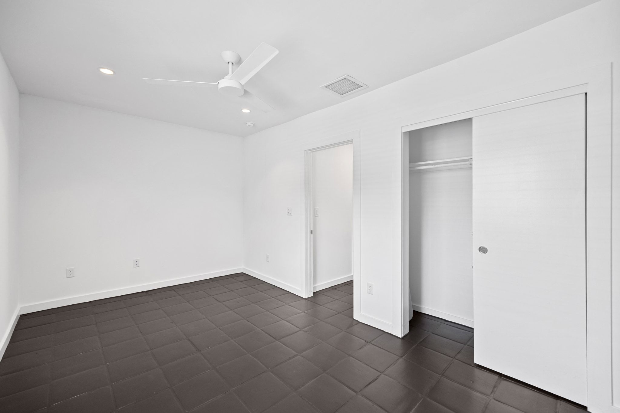 1200 Enfield Road, Unit 205 Austin, TX 78703 - Photo 8 of 20 an empty room with a bathroom