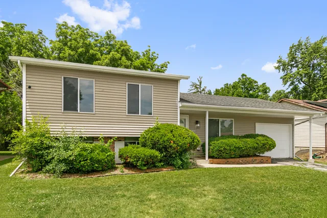 a house that has a lot of plants in it