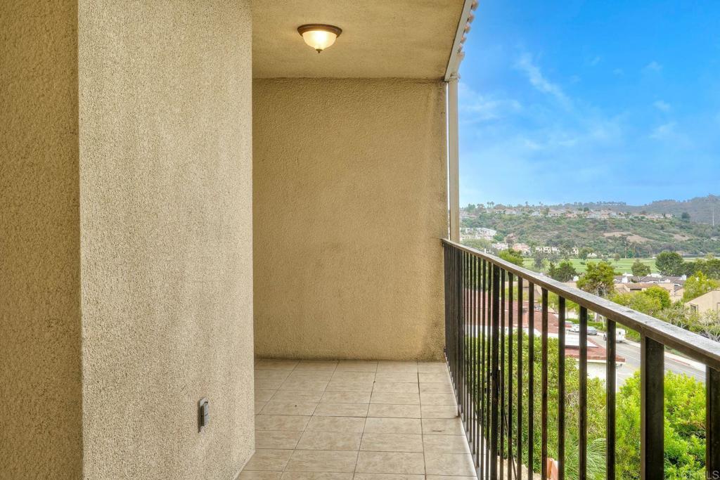 2251 Altisma Way, Unit 202 Carlsbad, CA 92009 - Photo 31 of 35 a view of balcony with furniture