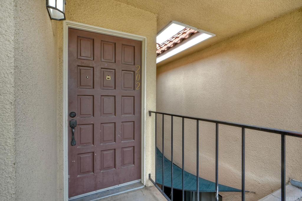 2251 Altisma Way, Unit 202 Carlsbad, CA 92009 - Photo 6 of 35 a view of a hallway