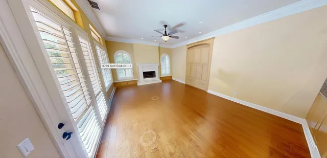 a view of a golf course with a lake view