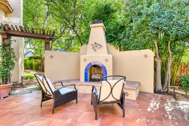 a living room with furniture or couch and a fireplace