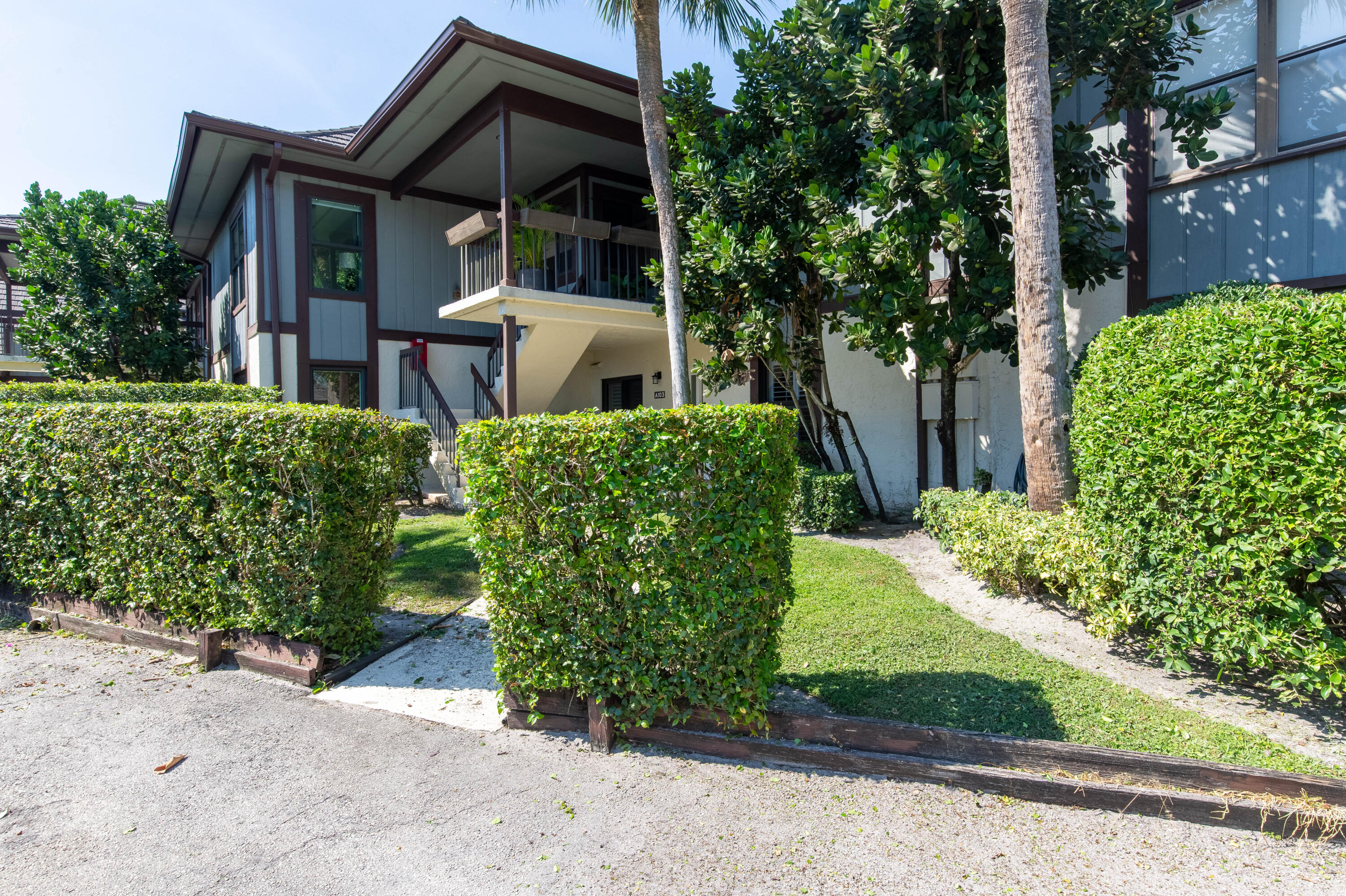 13329 Polo Club Road, Unit A 103 Wellington, FL 33414 - Photo 1 of 15 Front