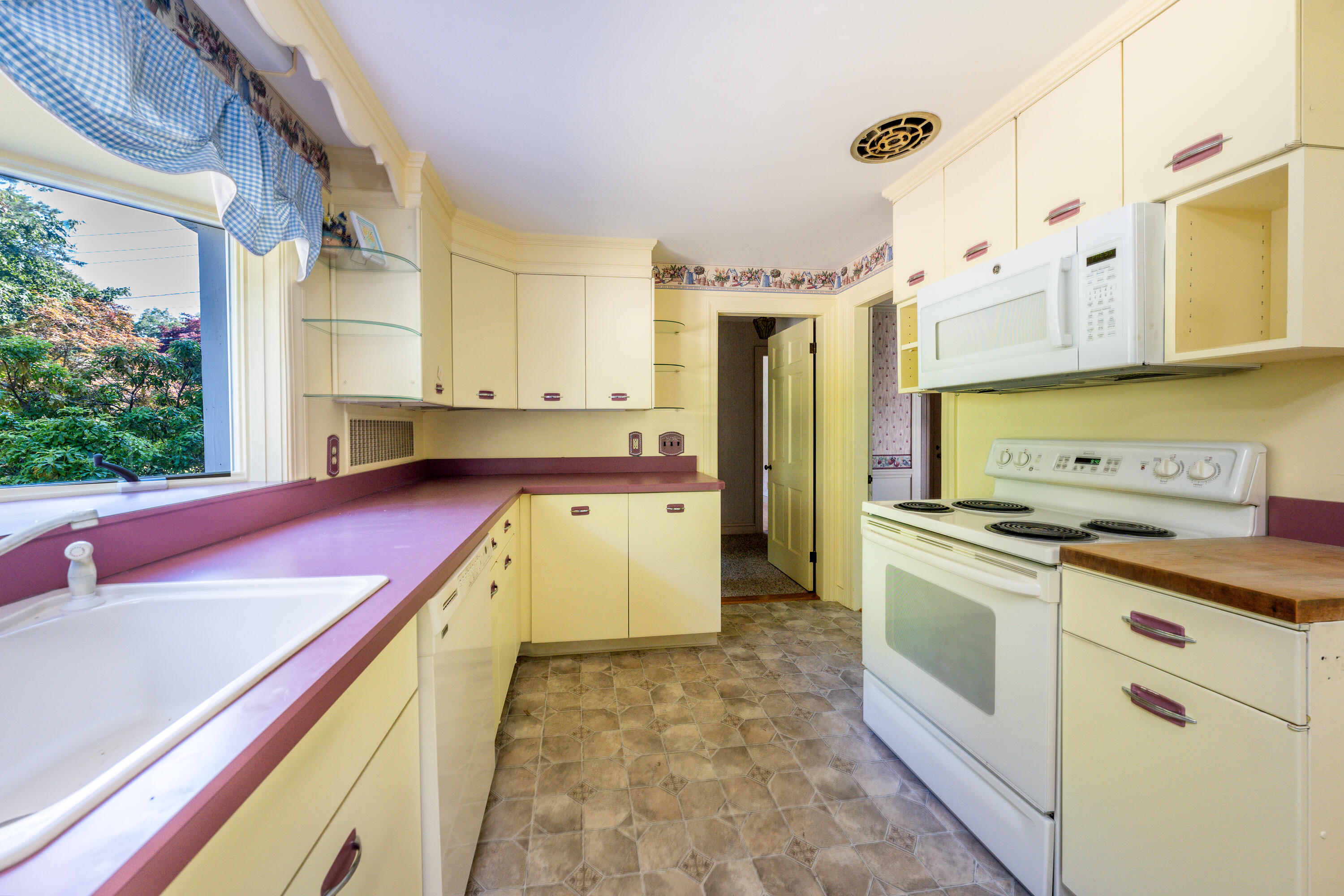 115 Old Stage Road Centerville, MA 02632 - Photo 11 of 32 a kitchen with stainless steel appliances granite countertop a lot of counter top space and cabinets