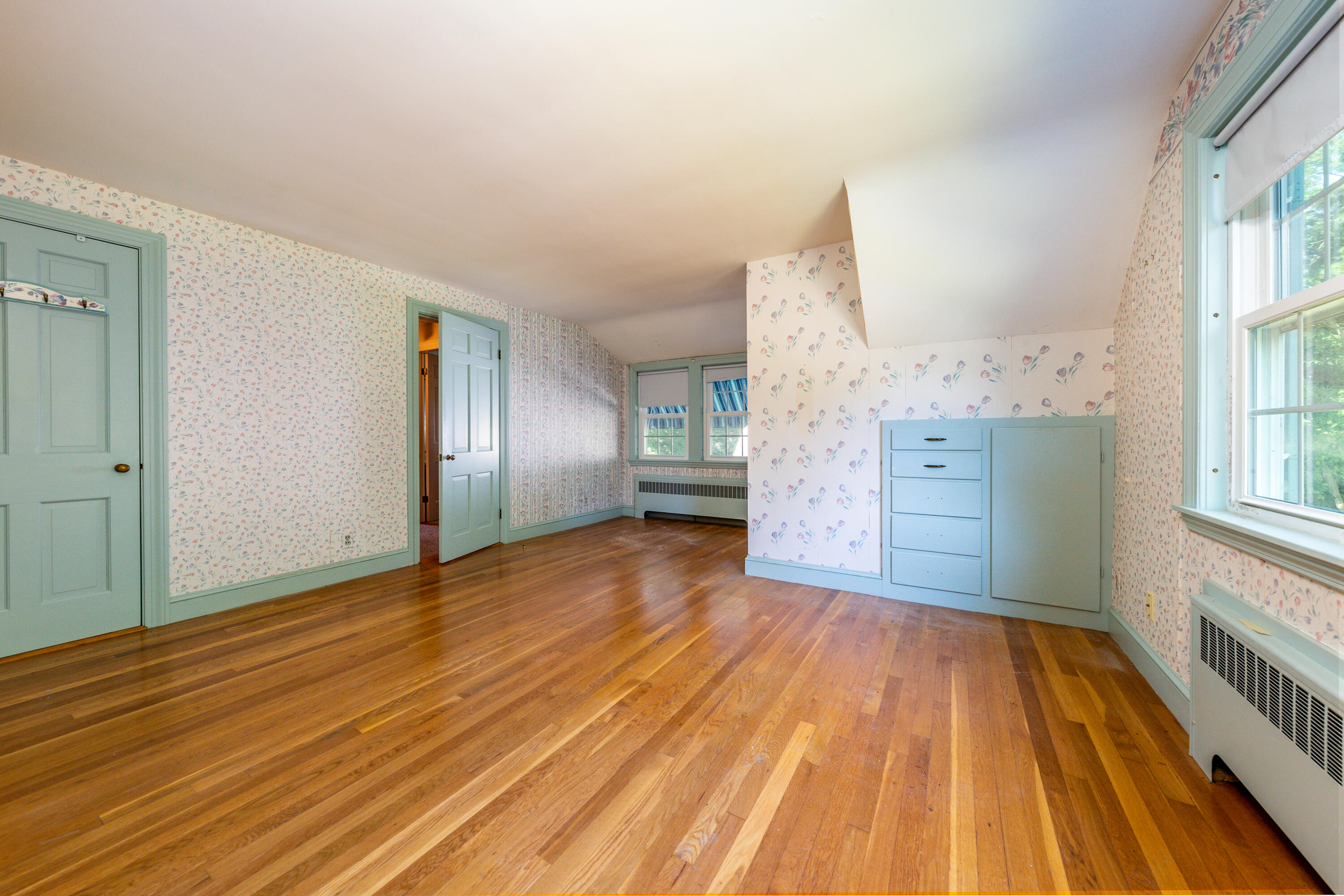 115 Old Stage Road Centerville, MA 02632 - Photo 19 of 32 wooden floor in an empty room and a window