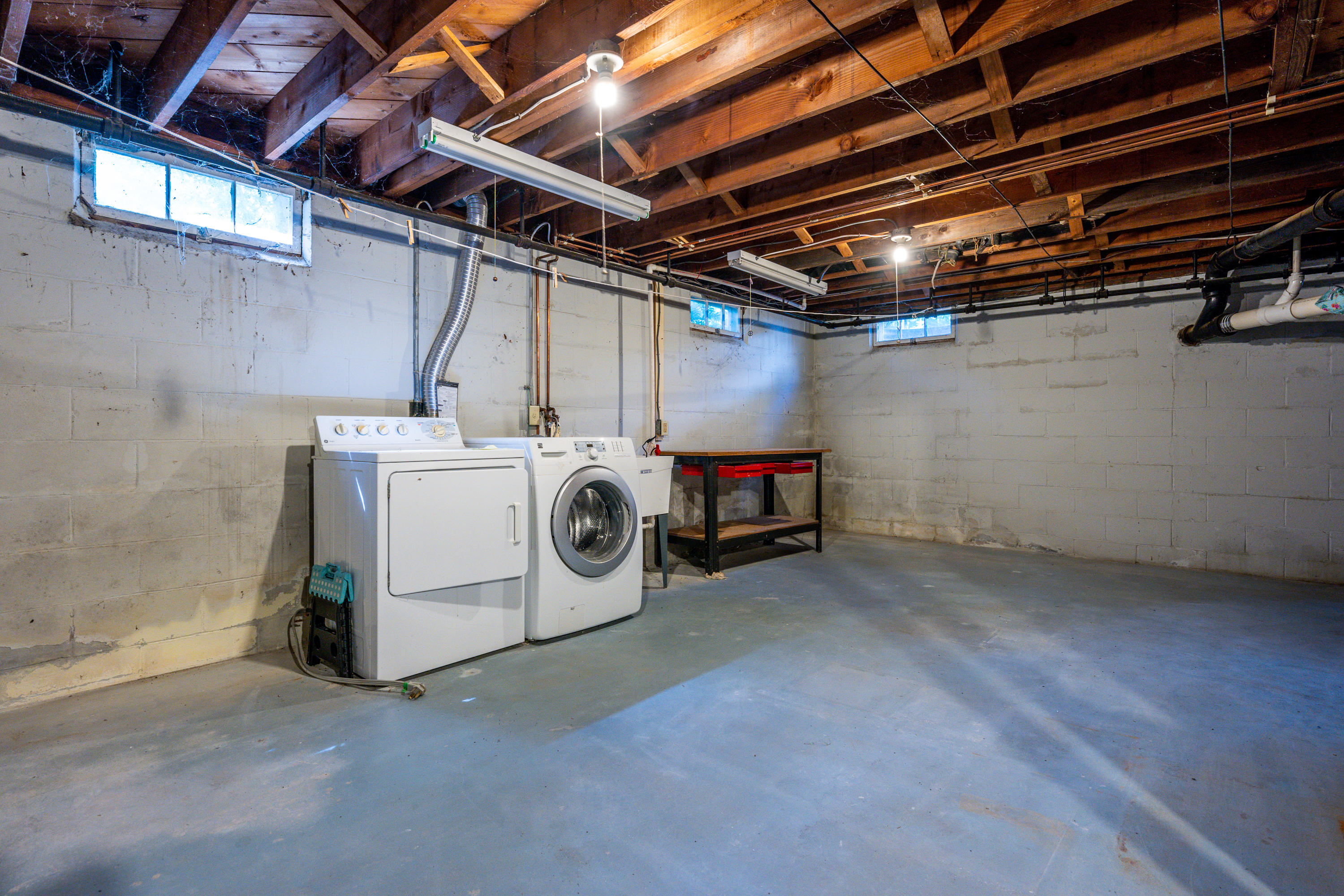 115 Old Stage Road Centerville, MA 02632 - Photo 22 of 32 a utility room with dryer and washer