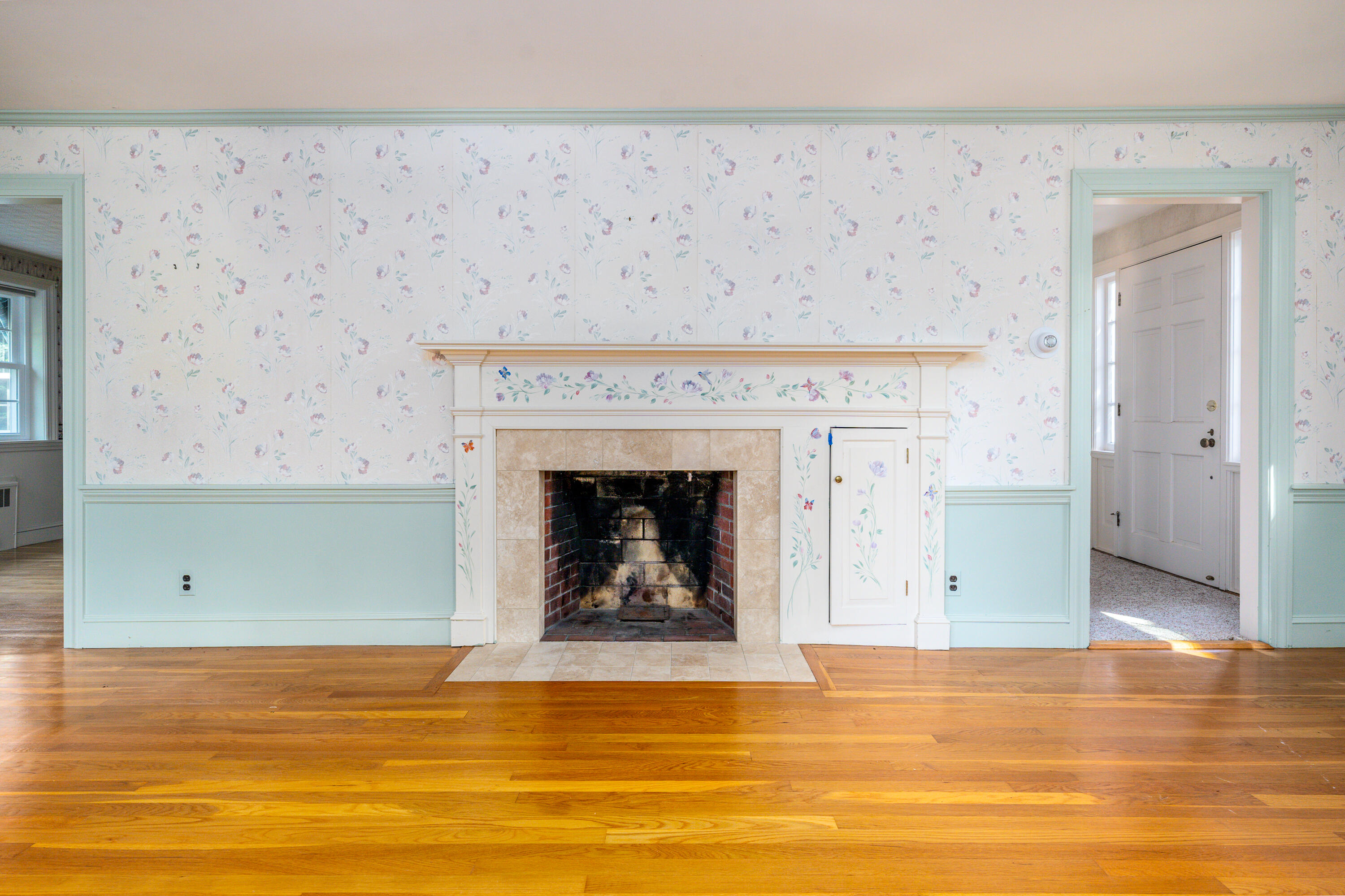 115 Old Stage Road Centerville, MA 02632 - Photo 6 of 32 a view of a livingroom with a fireplace