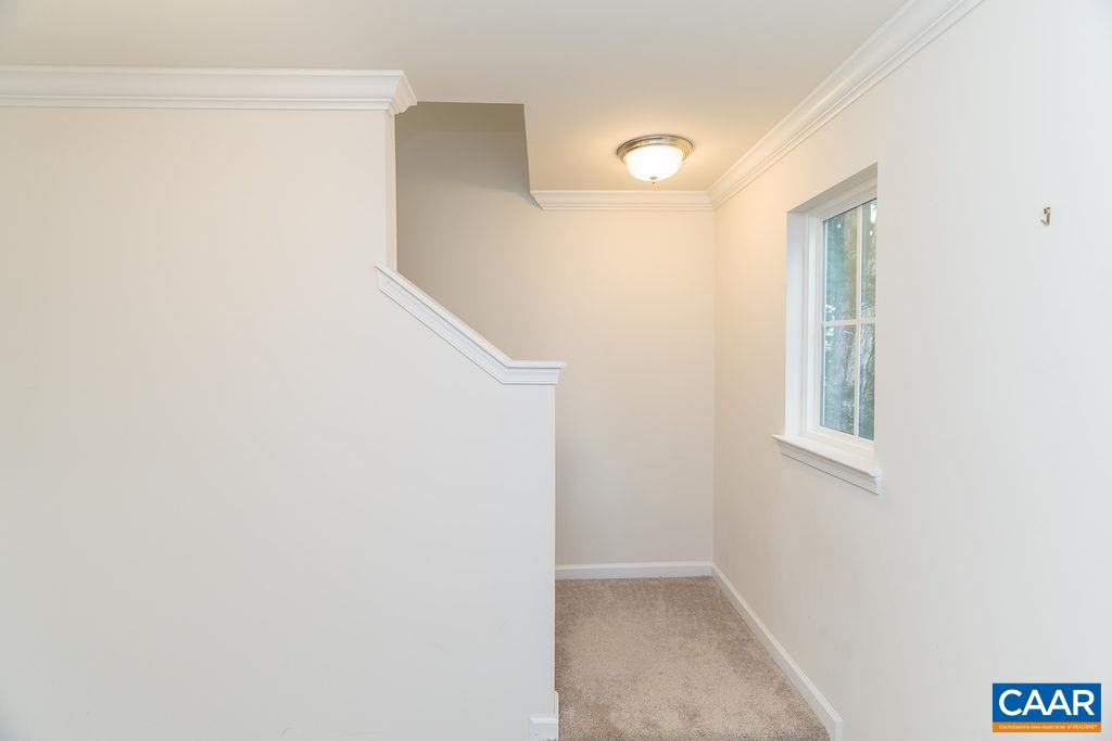 258 Larchmont Circle Ruckersville, VA 22968 - Photo 13 of 40 a view of hallway with front door