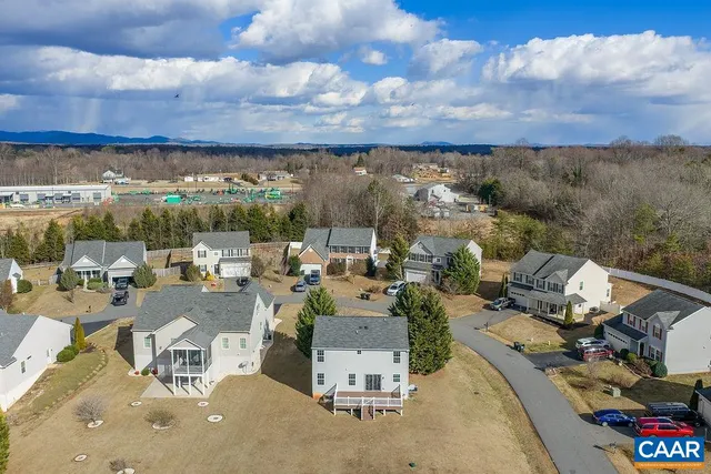 an aerial view of a house with a garden