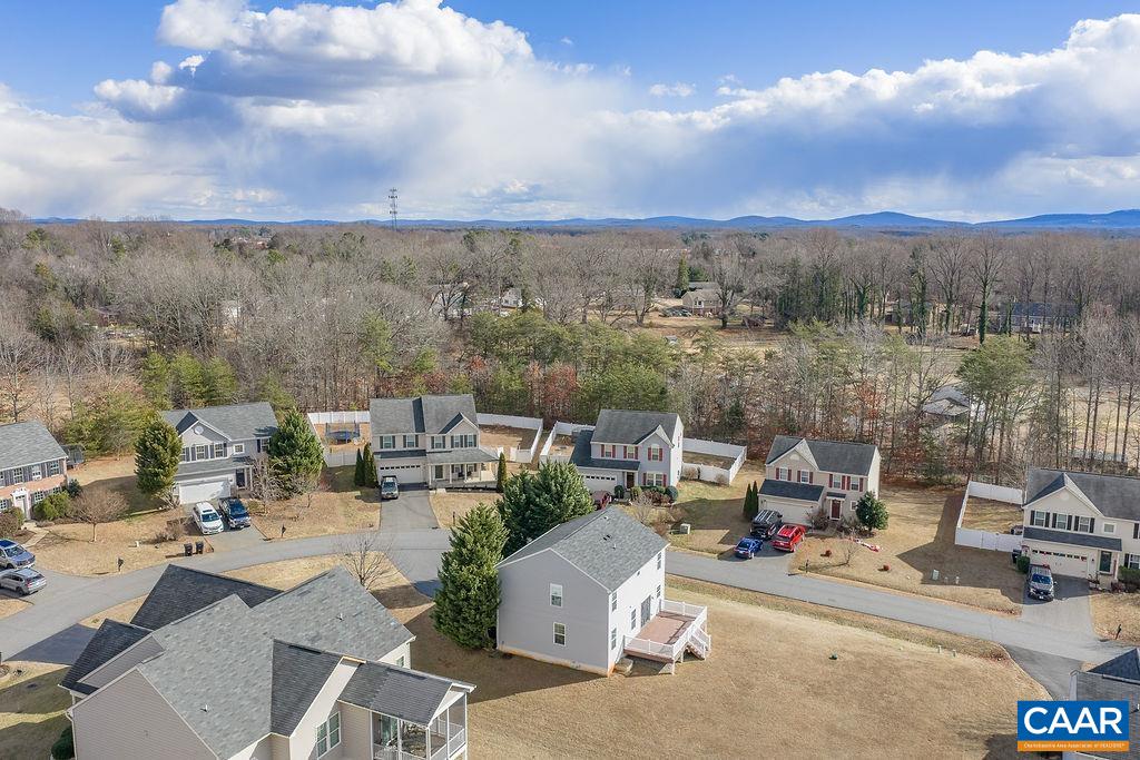 258 Larchmont Circle Ruckersville, VA 22968 - Photo 34 of 40 an aerial view of a house with a garden