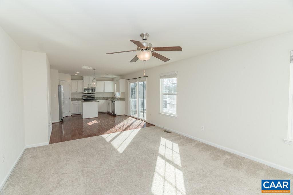 258 Larchmont Circle Ruckersville, VA 22968 - Photo 5 of 40 a view of a kitchen with a sink and a window