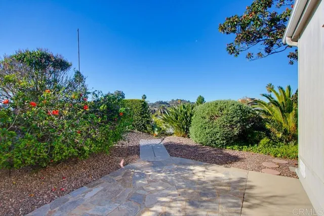a blue house with a outdoor space
