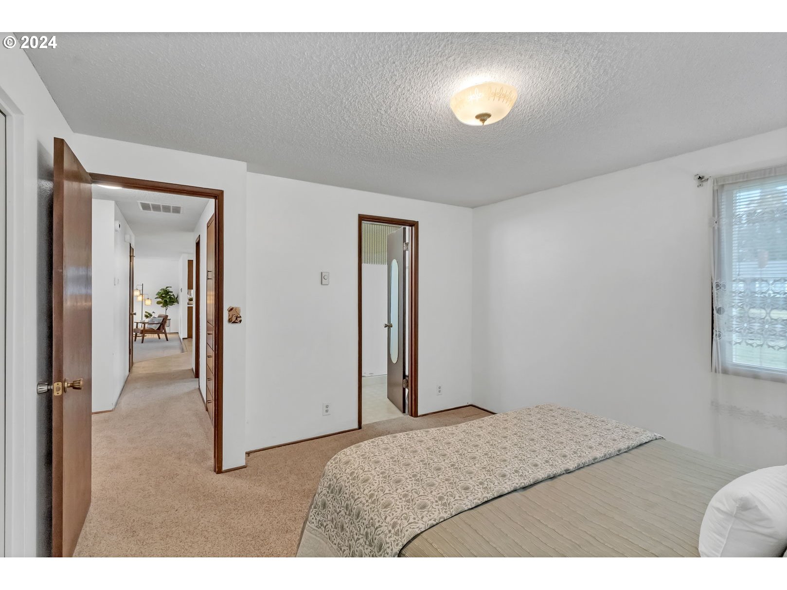 2510 20th Street Springfield, OR 97477 - Photo 11 of 21 a bedroom with a balcony and a lamp