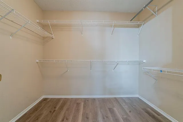 a view of a room with racks on the wall