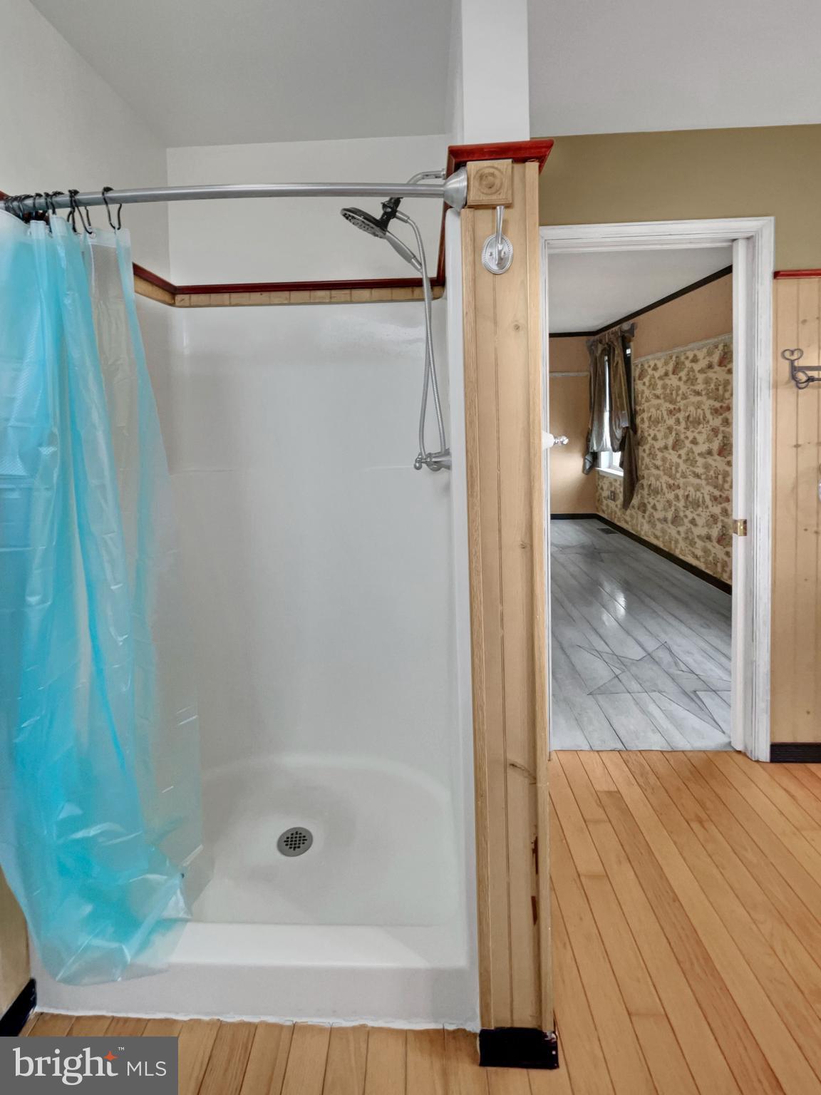 65 South Reamstown Road Stevens, PA 17578 - Photo 12 of 32 a bathroom with a glass shower door