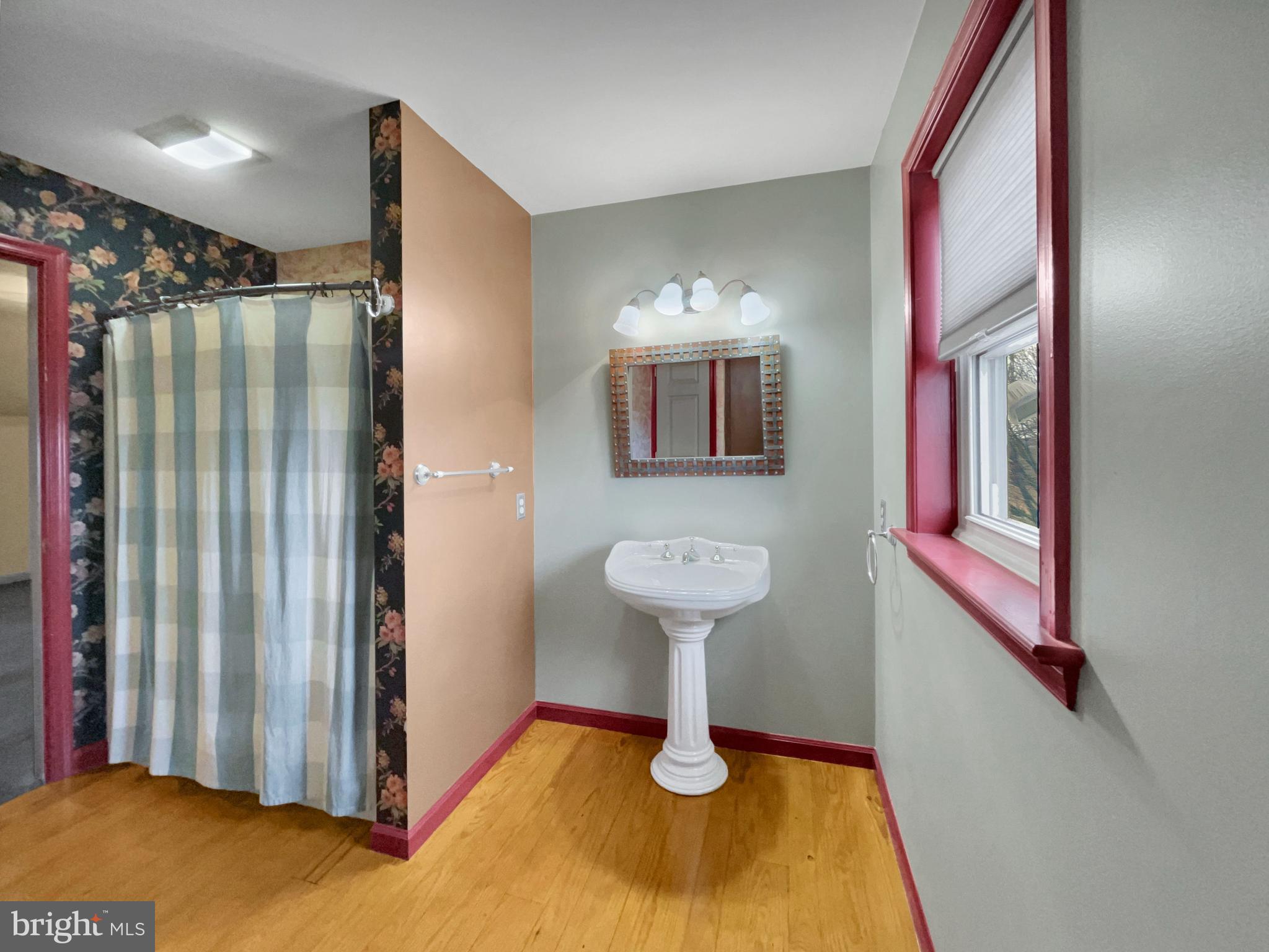 65 South Reamstown Road Stevens, PA 17578 - Photo 22 of 32 a bathroom with a sink and a mirror