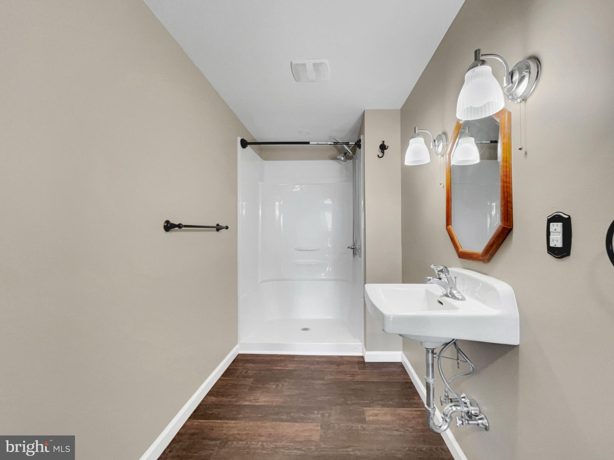 65 South Reamstown Road Stevens, PA 17578 - Photo 28 of 32 a bathroom with a sink a toilet and shower