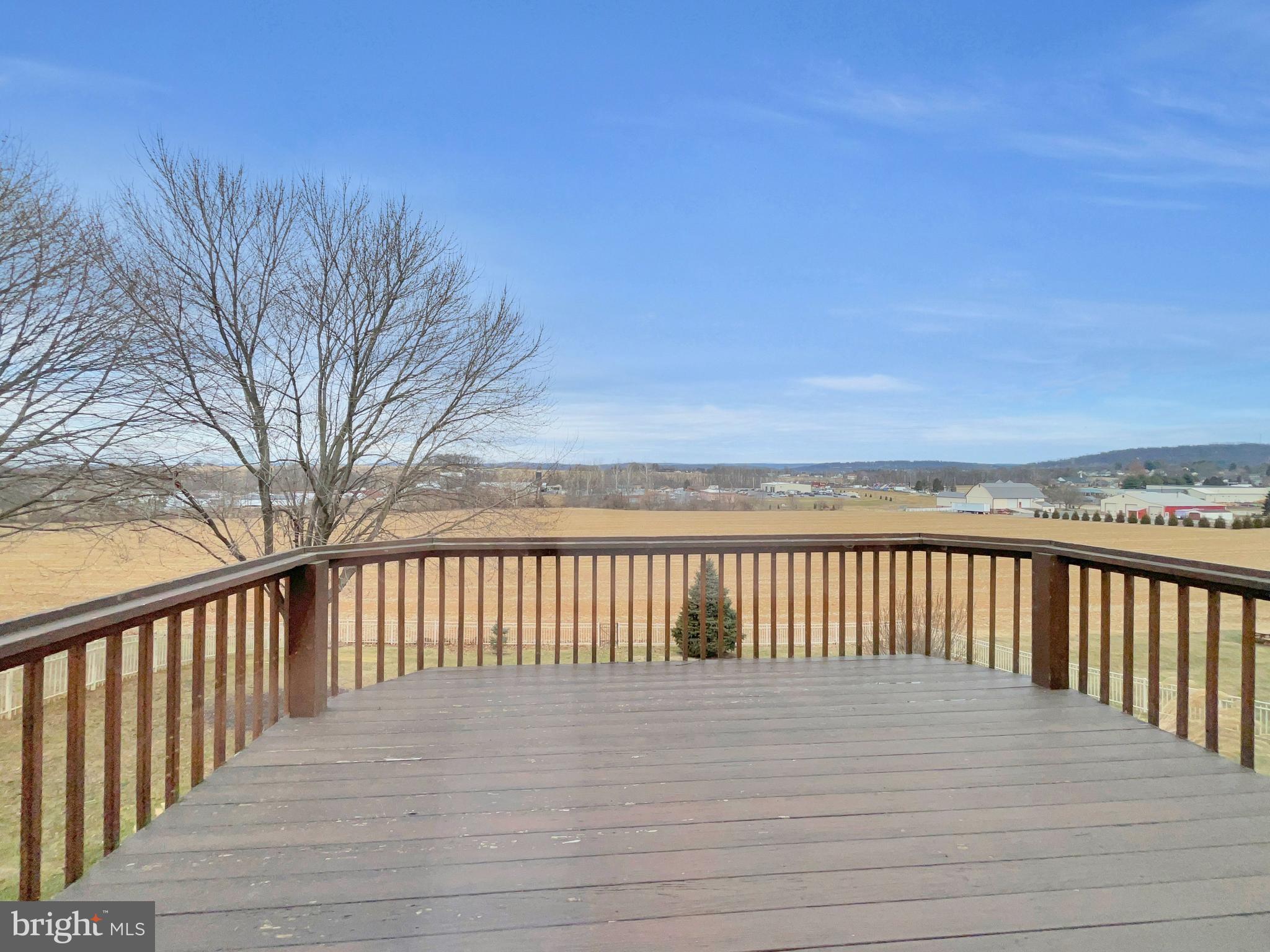 65 South Reamstown Road Stevens, PA 17578 - Photo 9 of 32 a terrace view with wooden floor and fence