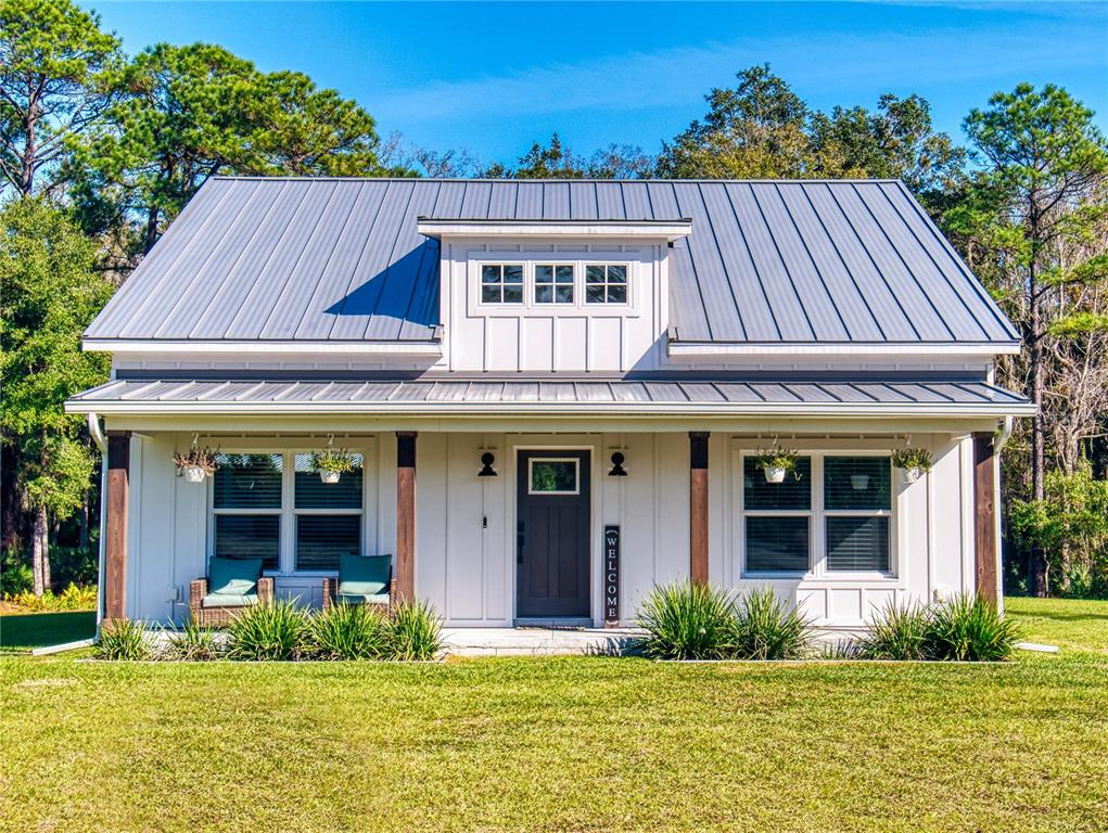 front view of a house with a yard