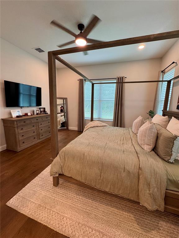 4275 Beacon Light Road Edgewater, FL 32141 - Photo 31 of 48 a bedroom with a bed and a flat screen tv
