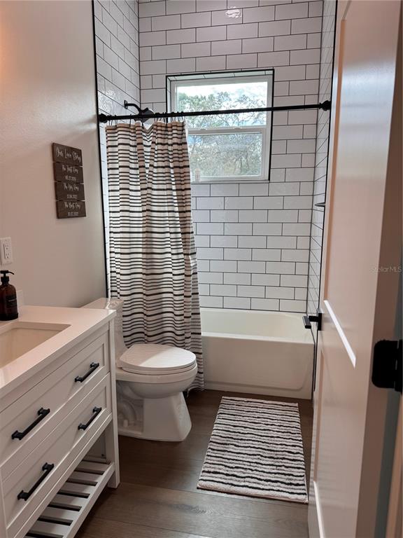 4275 Beacon Light Road Edgewater, FL 32141 - Photo 42 of 48 a bathroom with a toilet a sink and shower