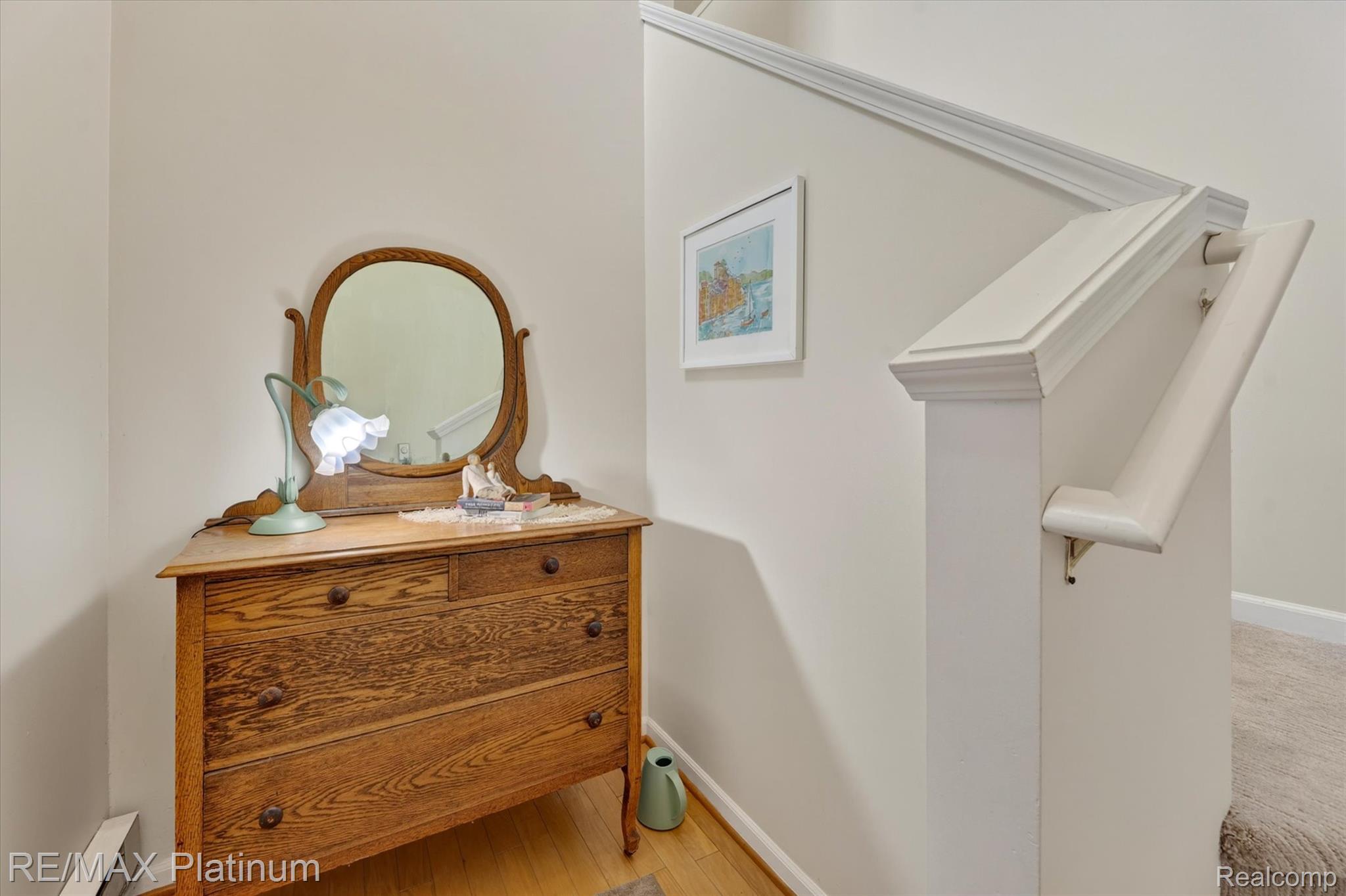 4191 Hampton Ridge Boulevard, Unit 41 Howell, MI 48843 - Photo 2 of 23 Detailed view of baseboard heating and wood finished floors