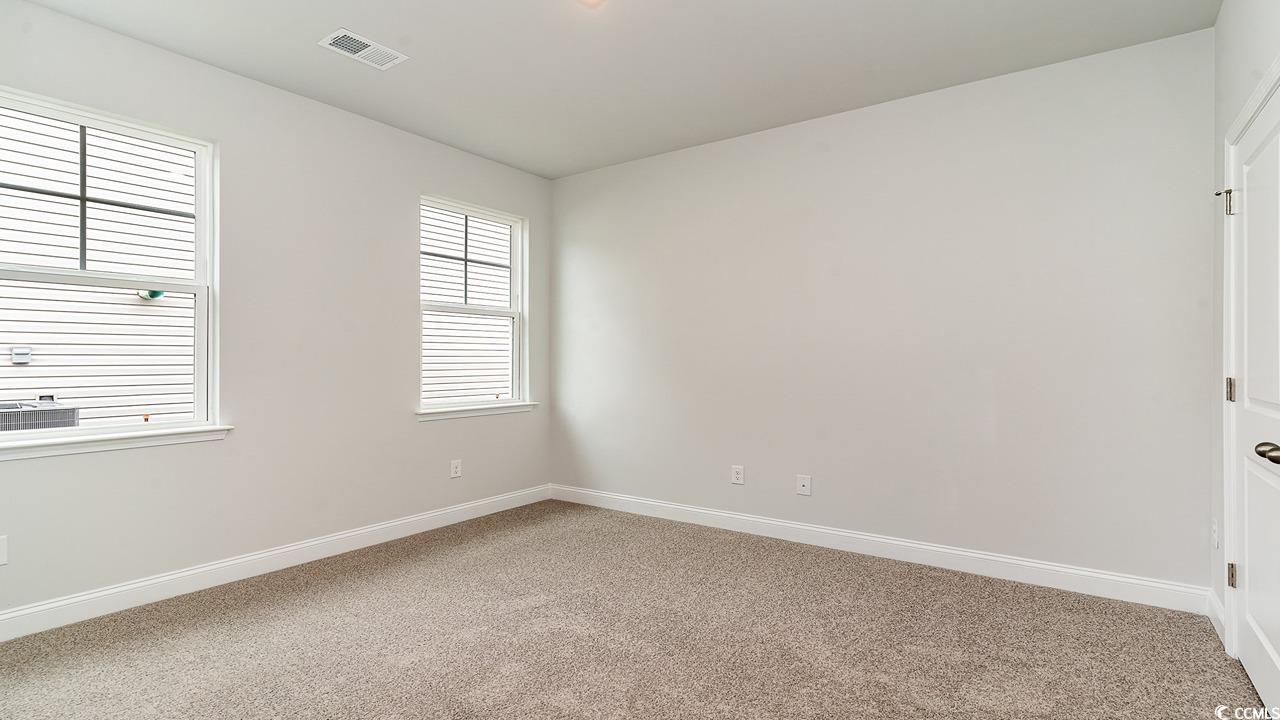 115 Rnch Hvn Drive Murrells Inlet, SC 29576 - Photo 11 of 25 View of carpeted spare room