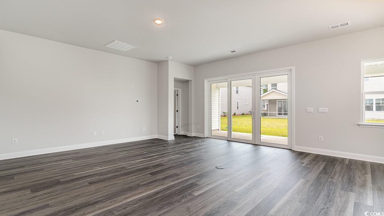 115 Rnch Hvn Drive Murrells Inlet, SC 29576 - Photo 20 of 25 Empty room with dark hardwood / wood-style floors