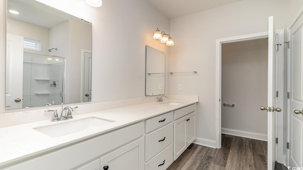 115 Rnch Hvn Drive Murrells Inlet, SC 29576 - Photo 5 of 25 Bathroom with hardwood / wood-style floors, vanity