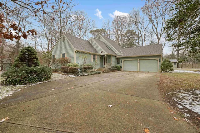 a cars parked in front of a house