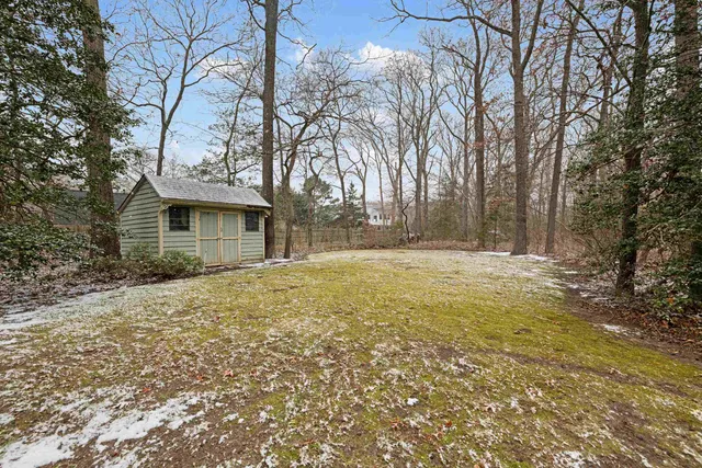 a view of a chairs in front of house