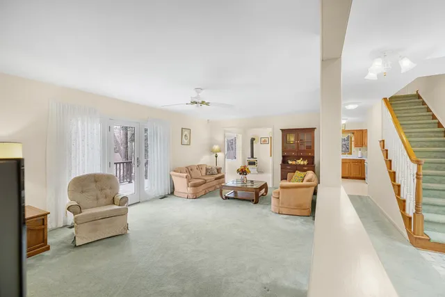 a living room with furniture and a couch