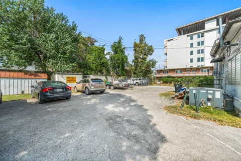 a view of a street with cars