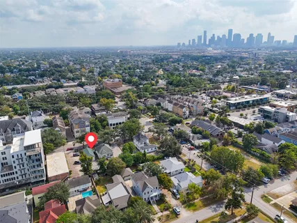 an aerial view of a city with lots of residential buildings