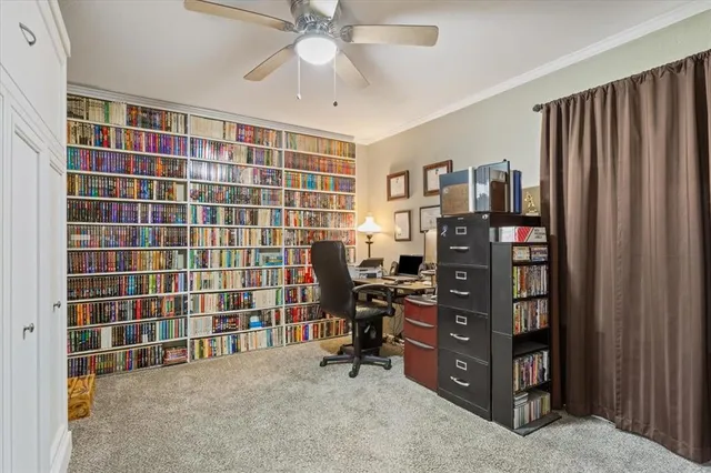 a view of a livingroom with a bookshelf