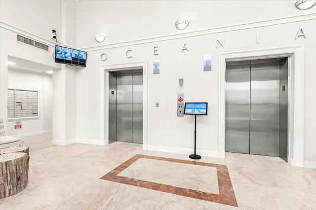 a bathroom with a shower and a sink