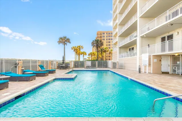 a bathroom with a glass door shower