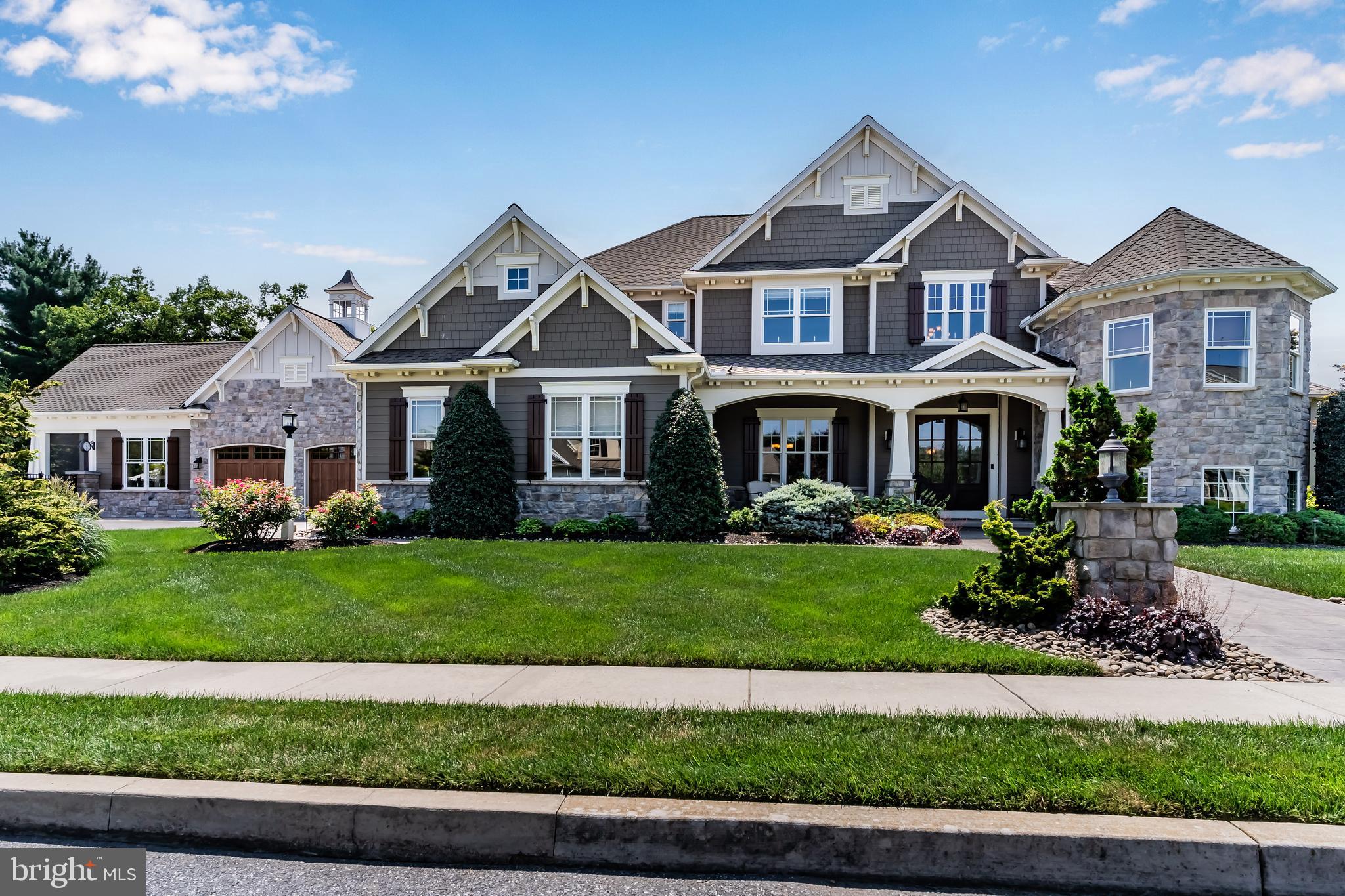 506 Jonagold Circle Mechanicsburg, PA 17055 - Photo 2 of 87 a front view of a house with a garden