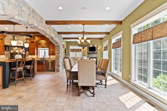 a view of a balcony with furniture and wooden floor