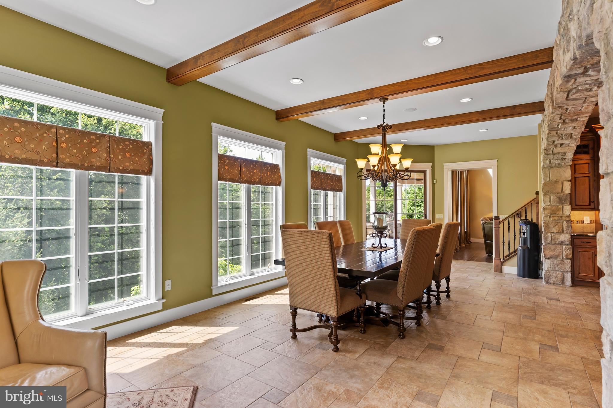 506 Jonagold Circle Mechanicsburg, PA 17055 - Photo 25 of 87 a dining room with furniture a chandelier and glass door
