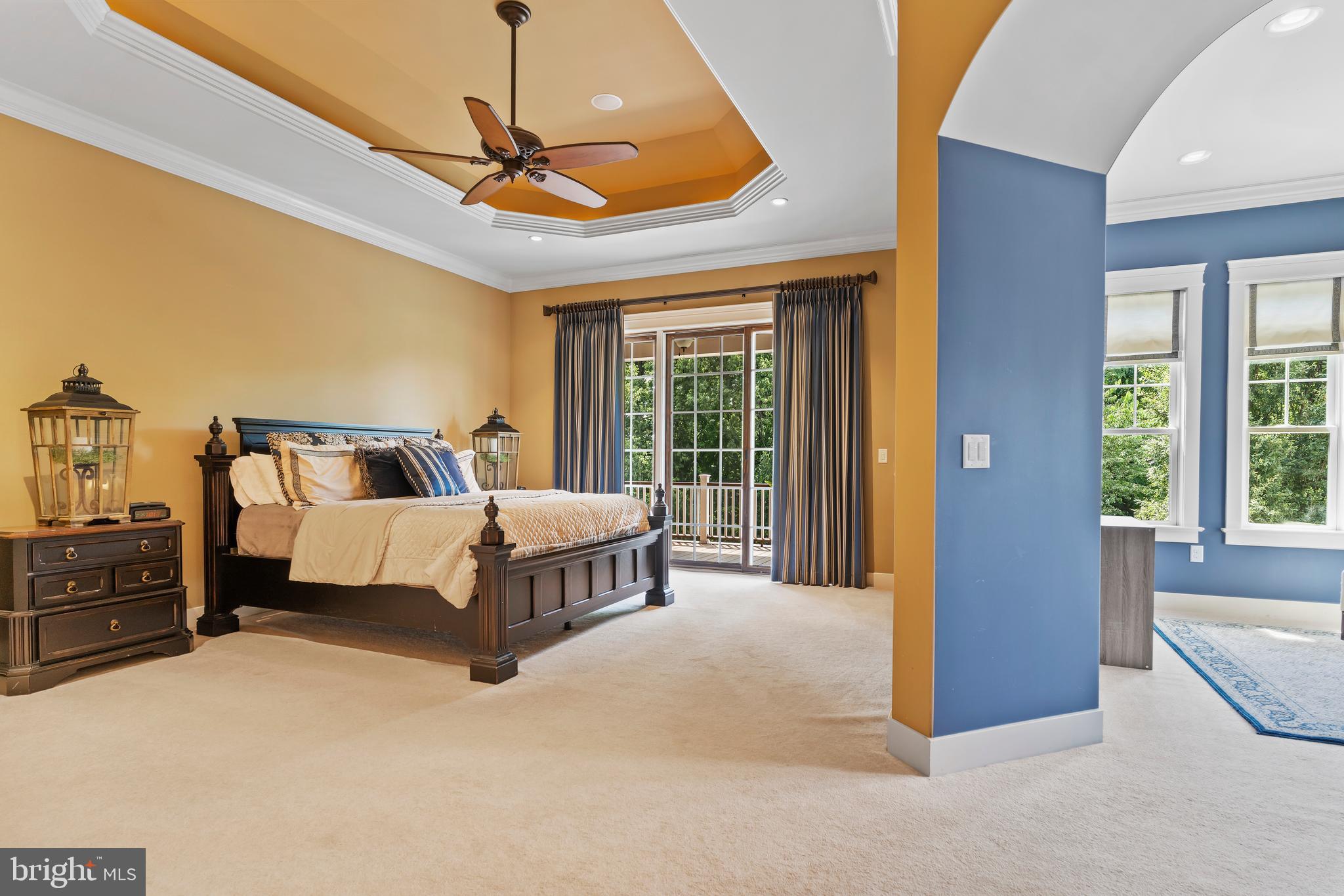 506 Jonagold Circle Mechanicsburg, PA 17055 - Photo 29 of 87 a spacious bedroom with a bed and a chandelier