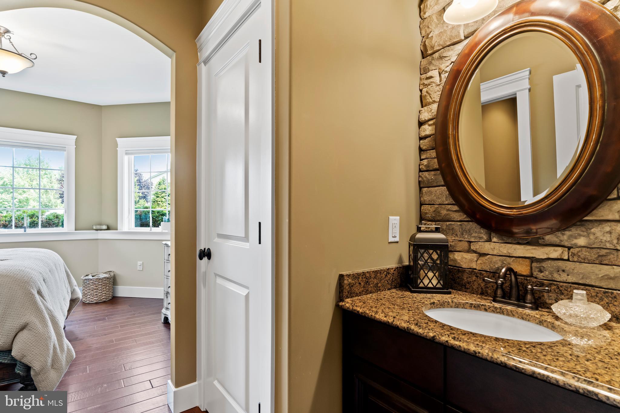 506 Jonagold Circle Mechanicsburg, PA 17055 - Photo 37 of 87 a bathroom with a granite countertop double vanity sink and a mirror