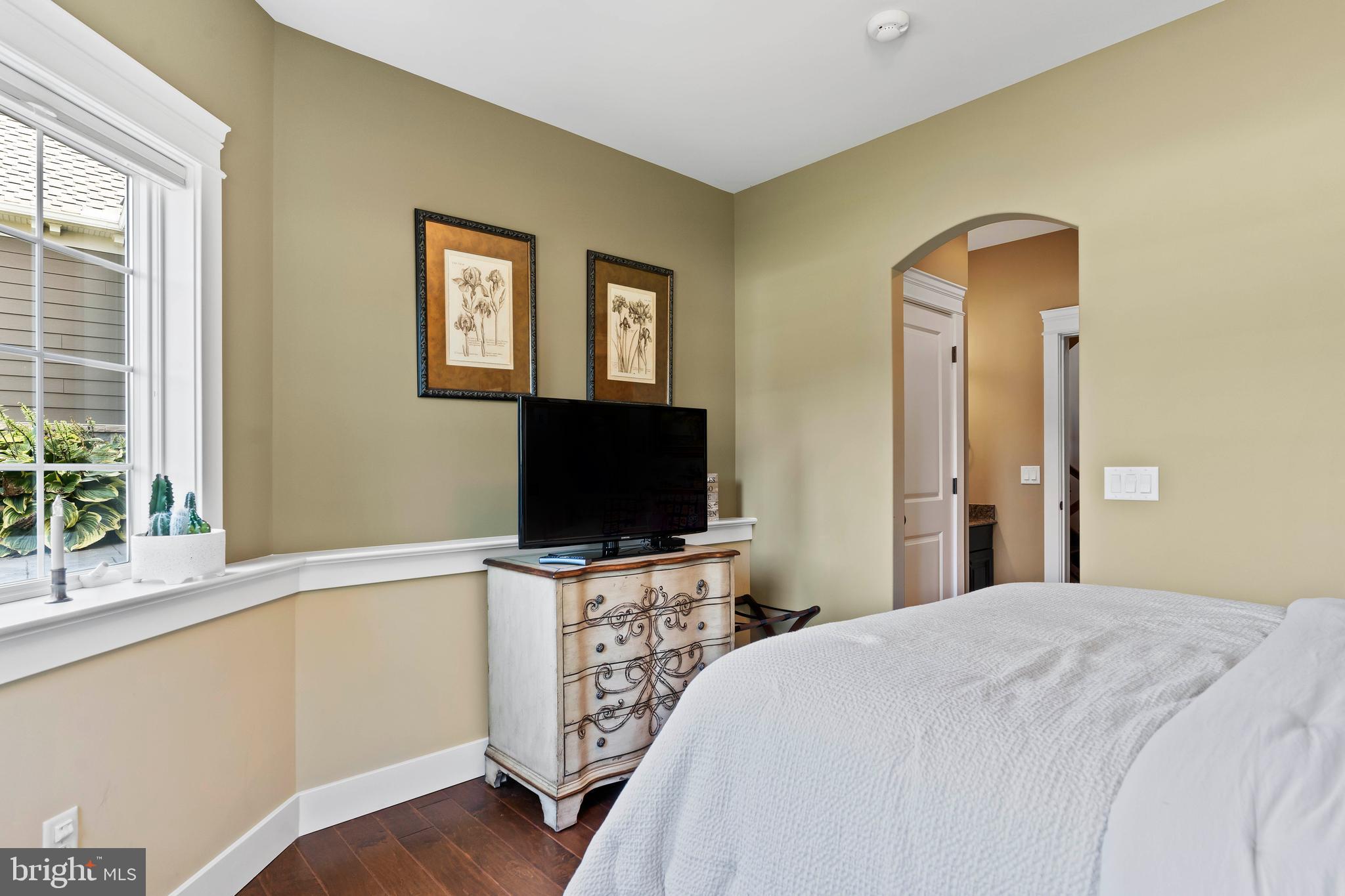 506 Jonagold Circle Mechanicsburg, PA 17055 - Photo 39 of 87 a bedroom with a bed and a flat screen tv