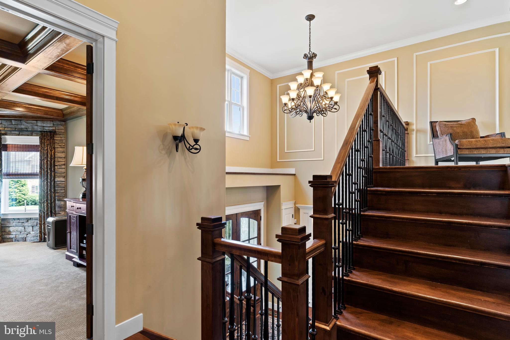 506 Jonagold Circle Mechanicsburg, PA 17055 - Photo 45 of 87 a view of a hallway with furniture and chandelier