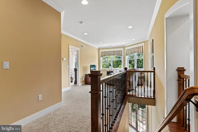 an aerial view of a house with swimming pool