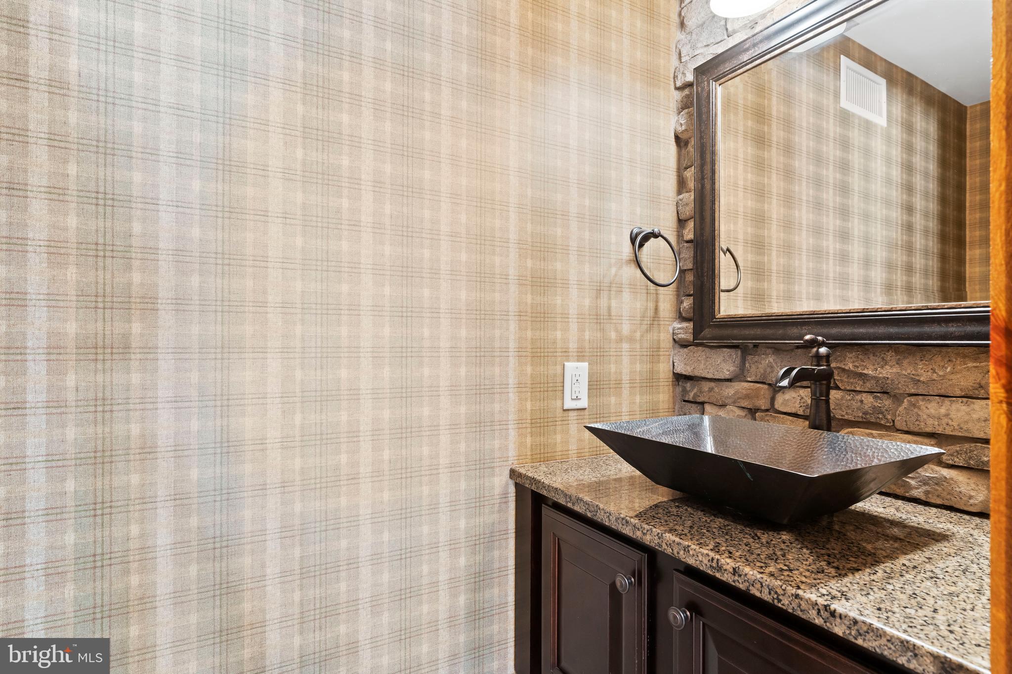 506 Jonagold Circle Mechanicsburg, PA 17055 - Photo 67 of 87 a bathroom with a granite countertop sink and a mirror