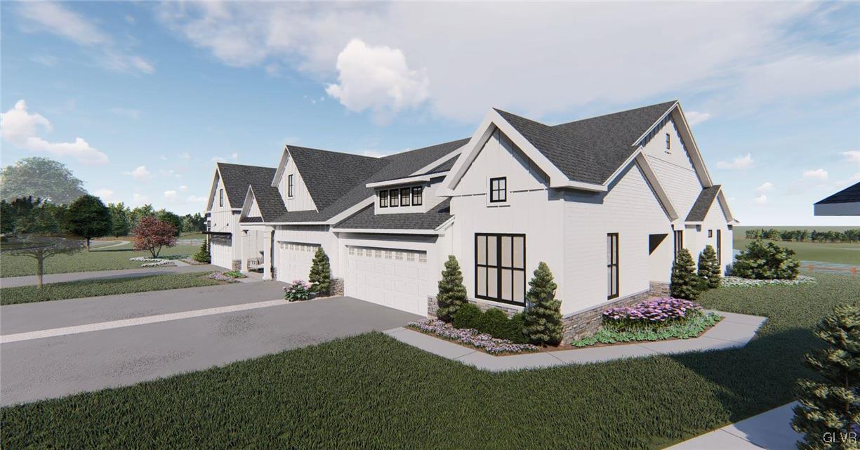 6916 Cedar Drive Bath, PA 18014 - Photo 14 of 19 a front view of a house with a yard and potted plants