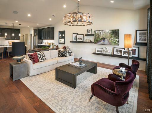 6916 Cedar Drive Bath, PA 18014 - Photo 6 of 19 a living room with furniture kitchen view and a chandelier